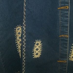Long jean jacket with embroidery on it. No tags bu
